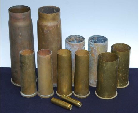 A WW I 13 PR 9 CWT artillery shell, dated 1917, h.29.5cm, together with eleven other shells. (12)