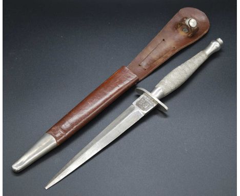 A Fairbairn-Sykes 1st Pattern Commando fighting knife, the 16.5cm double edged spear-point blade (tip missing) marked to the 