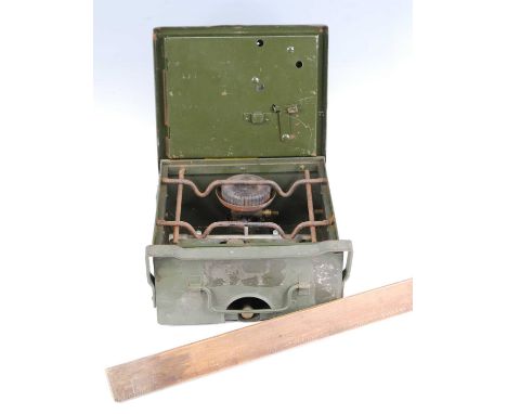 A post WW II British Army Field Camp Stove, w.24, d.24, h.12cm, together with a wooden gauge, possibly a tank fuel gauge, wit