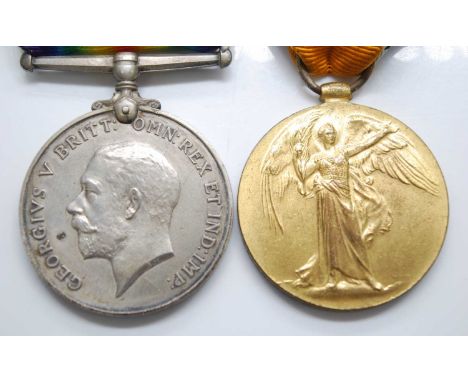 A WW I British War and Victory pair, naming 22158 PTE. A.V. SALMON. R. WAR. R., together with a WW II Defence medal, Royal Pi