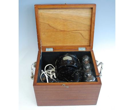 A WW II Air Ministry Aldis Signalling Lamp, marked AM 5A/760, serial no. 219464, in fitted mahogany case, w.31, d.25, h.20cm.
