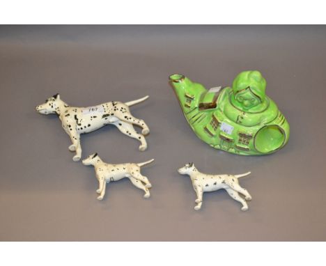 Group of three Beswick figures of dalmatians together with a Lingard 1930's pottery teapot ' The Old Lady Who Lived in a Shoe