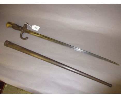 19th Century French bayonet with original steel scabbard, engraved St. Etienne, 1880, numbered 16897