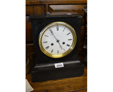 19th Century Belgian slate mantel clock having circular enamel dial with Roman numerals, the two train movement striking on a