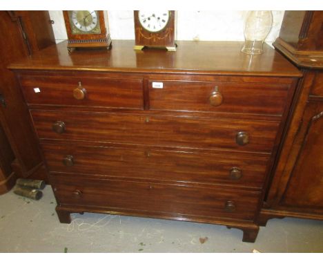 Early 19th Century mahogany straight front chest of two short and three long graduated drawers with knob handles raised on br