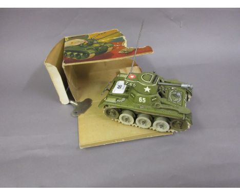 German tin plate clockwork model of a tank, Gama, with a fragment of original box
