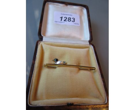 15ct Gold bar brooch set with a pearl and enamel decorated duck