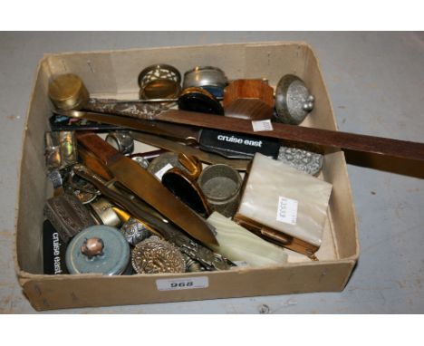 Quantity of various paper knives together with a quantity of various small trinket boxes and a compact