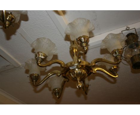 Reproduction brass seven light electrolier with frosted glass shades