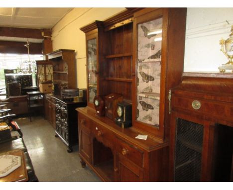 19th Century oak dresser, the shelf back with two glazed doors above drawers and doors