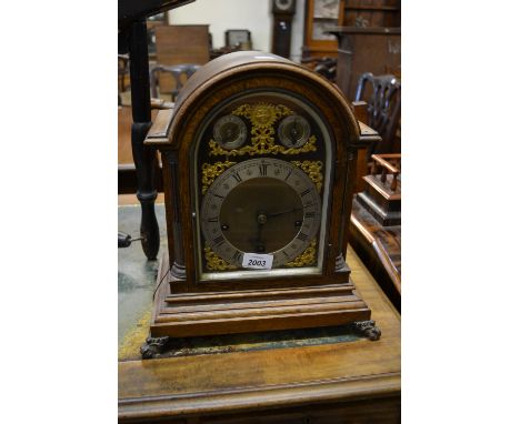 Late 19th Century oak dome top bracket clock, the silvered and gilded dial with Roman and Arabic numerals and two subsidiary 