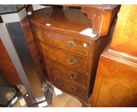 Reproduction burr walnut serpentine fronted chest of four drawers raised on bracket feet