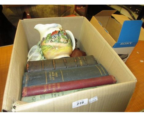 Box containing a quantity of miscellaneous items including: four books, two Hornsea Toby jugs, cased camera, binoculars, domi