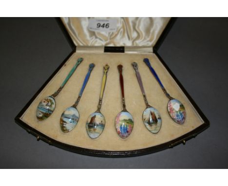 Cased set of six Birmingham silver and enamel decorated coffee spoons, the backs decorated with landscapes and shipping scene