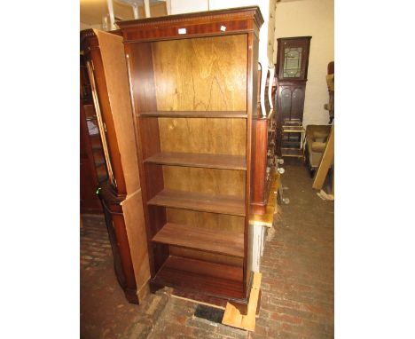 20th Century mahogany tall open bookcase with five adjustable shelves, raised on bracket feet