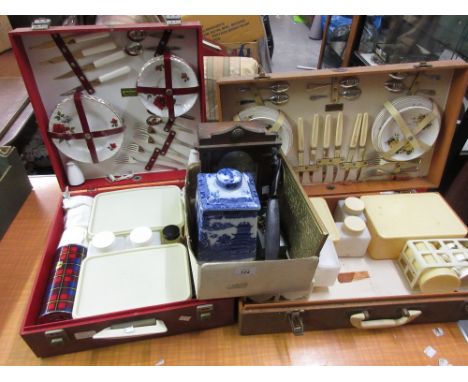 German oak cased mantel clock, a Ringtons tea caddy, a brass wall plaque, African hardwood paper knife and a bottle stopper, 
