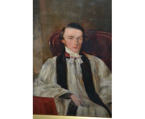 19th Century oil on panel, portrait of a seated clergyman, 10ins x 8ins, housed in an ebonised frame