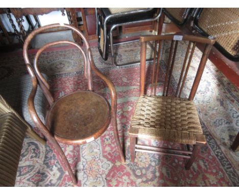 Childs bentwood elbow chair together with a childs stick back chair