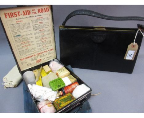 Black skin handbag with gilt metal mounts, together with a Boots tin First Aid box