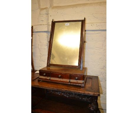 George III mahogany rectangular swing frame box toilet mirror with three drawer ogee fronted base and bracket feet