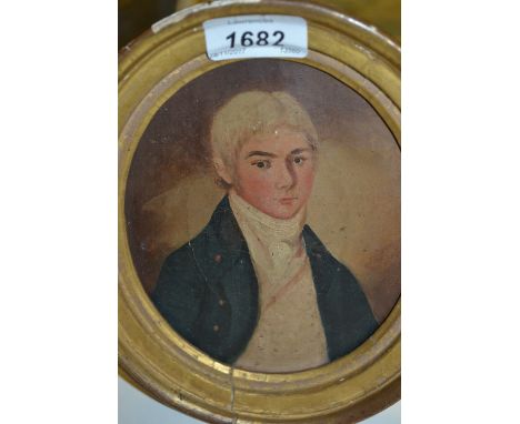 Small 19th Century oval gilt framed oil on canvas, half length portrait of a young man
