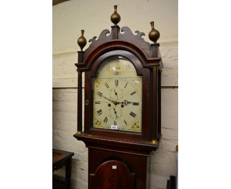 George III mahogany longcase clock, the arched hood with shaped pediment above an arched door, the painted enamel dial with R