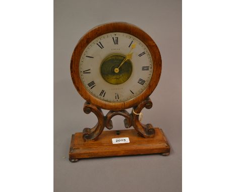 William IV / early Victorian rosewood and inlaid night clock, the glass dial with painted Roman numerals, the hands driven by