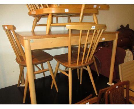 Mid 20th Century Ercol rectangular dining table and four chairs