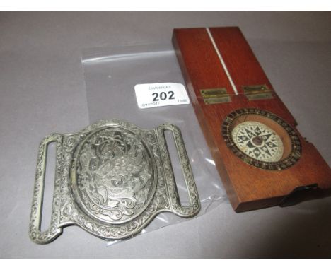 19th Century mahogany cased pocket compass together with an oriental metal buckle