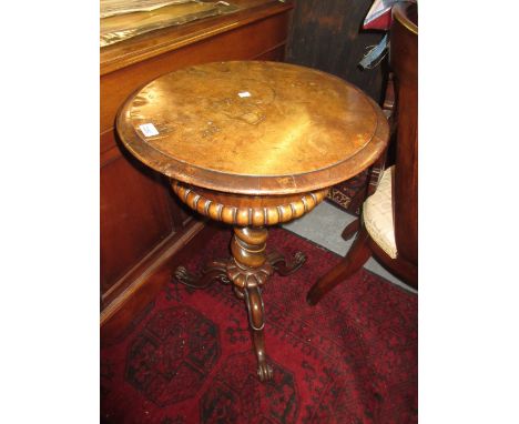 Victorian circular walnut work table on a spiral twist column and tripod supports
