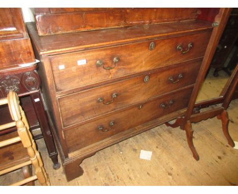 George III mahogany three drawer tallboy base with brass swan neck handles and bracket feet