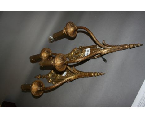 Pair of late 19th Century brass twin light wall appliqués