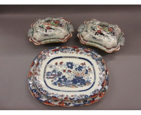 Two 19th Century Minton Amherst pattern red and blue decorated meat dishes together with a pair of Ashworth Brothers tureens 