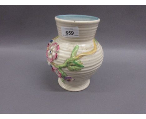 1930's Clarice Cliff Newport pottery baluster form vase with relief moulded flower decoration