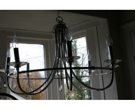 Modern chrome circular electrolier and a brass three light electrolier with glass shades together with a spelter knight in ar