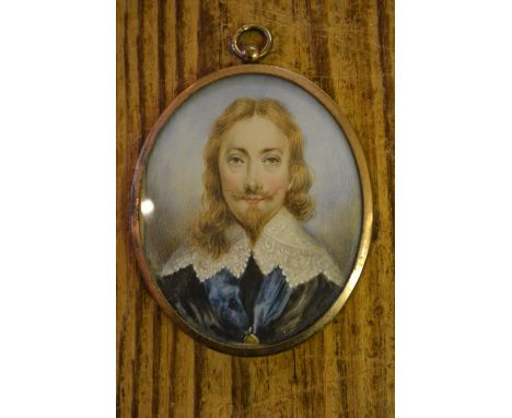 Antique oval framed miniature portrait of a 17th Century nobleman with white lace collar.