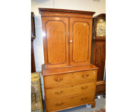 George III mahogany and inlaid secretaire bookcase, the dentil moulded cornice above two panelled doors, the base with a fitt