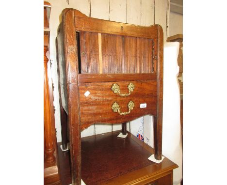 George III mahogany tray top commode with a tambour door above a pull-out base on square cut supports (for restoration)