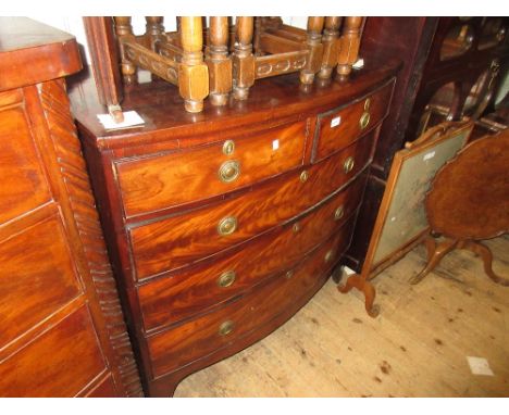 19th Century mahogany bow fronted chest of two short and three long graduated drawers with brass ring handles, raised on brac