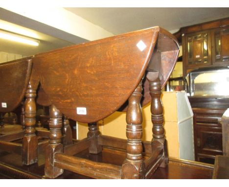 Small oak oval drop-leaf occasional table, nest of tables, standard lamp and a nursing chair