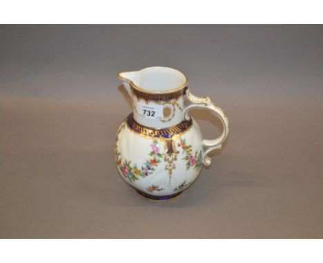 Late Dresden mask head and floral decorated jug together with a 19th Century Continental porcelain figure of a girl carrying 