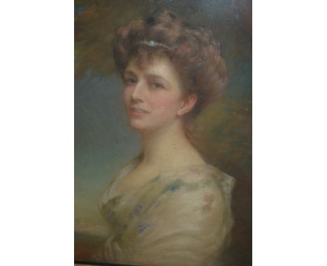 Late 19th / early 20th Century pastel, head and shoulder portrait of a lady with white dress, signed in the top right Ellis R