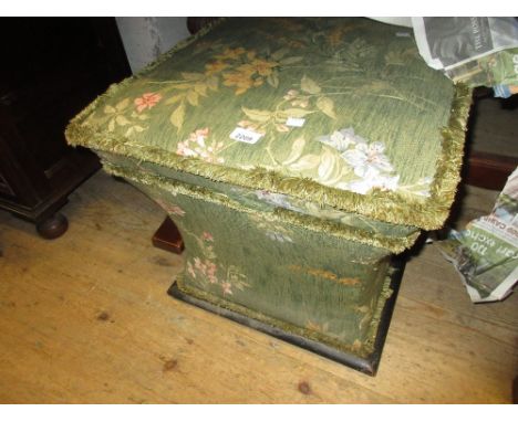 Victorian green floral upholstered waisted box stool with hinged top raised on brass and ceramic casters (a/f)