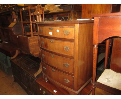 Reproduction mahogany bow fronted chest of four graduated drawers, raised on bracket feet