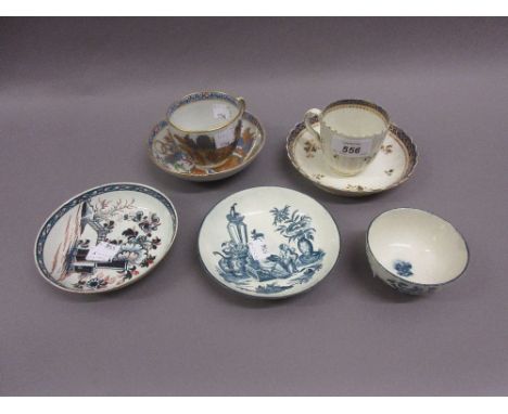 First period Worcester blue and white decorated cup and saucer, an early Salopian cup and saucer, a Newhall tobacco leaf patt