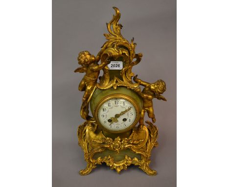 Good quality 19th Century French gilded spelter and onyx mantel clock in 18th Century style, the rococo design case mounted w