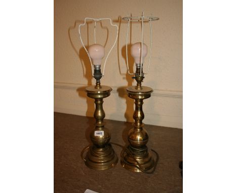 Pair of brass baluster column table lamps together with a brass standard lamp