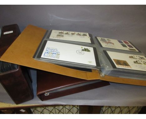 Three albums containing a collection of British postal covers and First Day covers