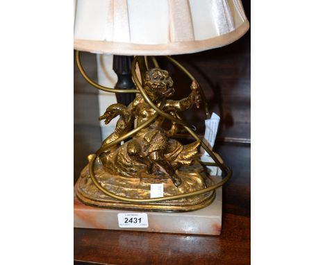 Gilded metal figural table lamp
