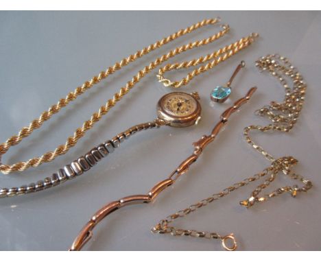 Four various 9ct gold chains, a 9ct gold watch strap, a 9ct gold pendant and a ladies gold cased wristwatch (a/f) with gold p
